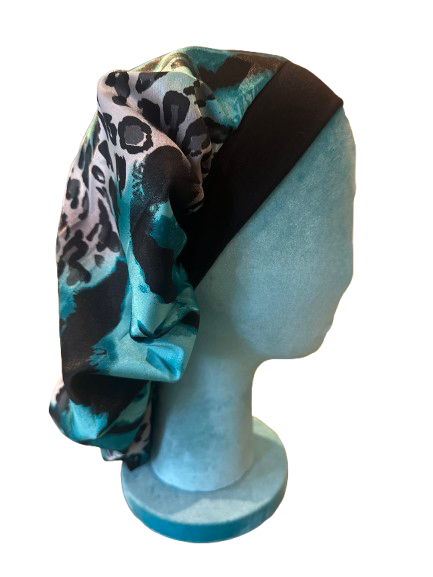 The mimi silky bonnet in blue black animal print