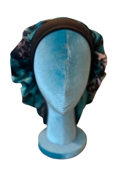 The mimi silky bonnet in blue black animal print